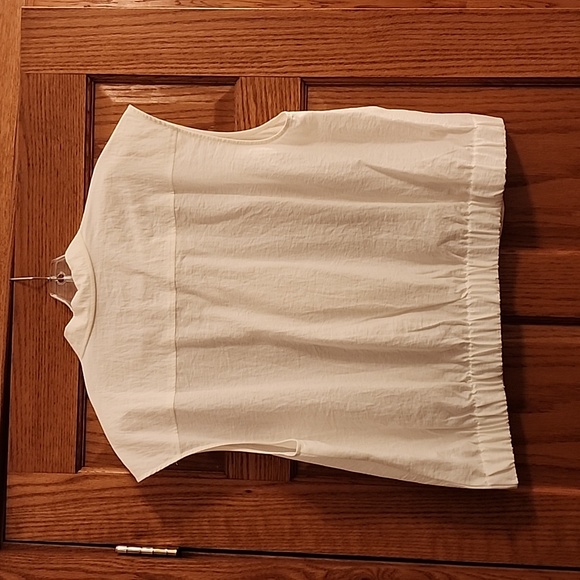 Sleeveless button up shirt. - Picture 3 of 6